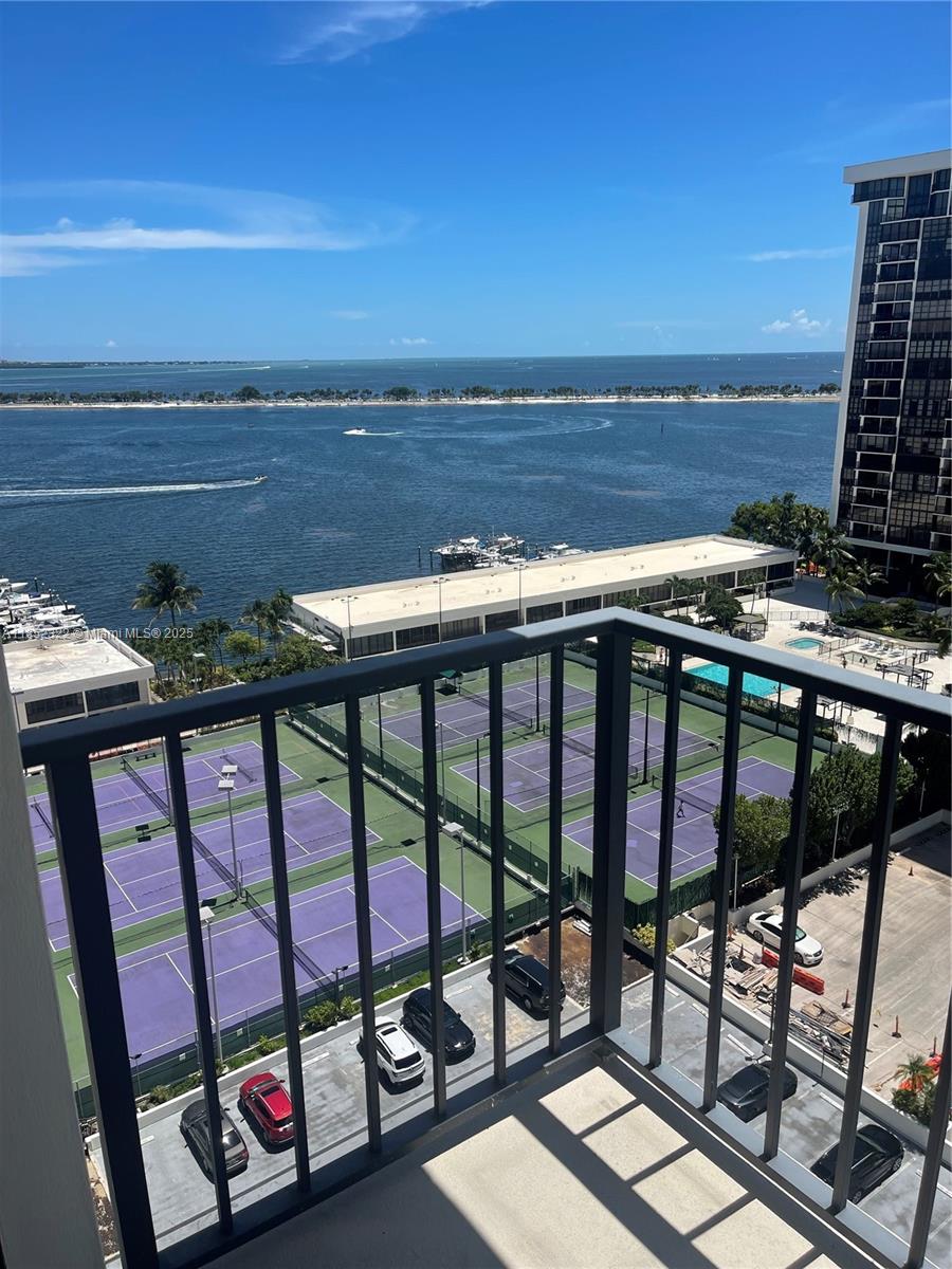 Spectacular Bay and city views from this one bedroom, 1.5 bath unit in highly sought after Brickell Place. Large balcony, washer and dryer inside unit, walk-in closet and linen closet built with Elfa closet system. Full service building with 24 hour security, valet, gym, tennis and racquetball courts, pool and BBQ area. Perfect for those seeking comfort and sophistication in this vibrant community. Walking distance to all that Brickell has to offer.