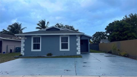 Photo of 3211 NW 191st St, Miami Gardens, FL 33056 (MLS # A11992981)
