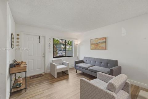 Photo of 9853 Riverside Dr #8-24, Coral Springs, FL 33071 (MLS # A11974081)