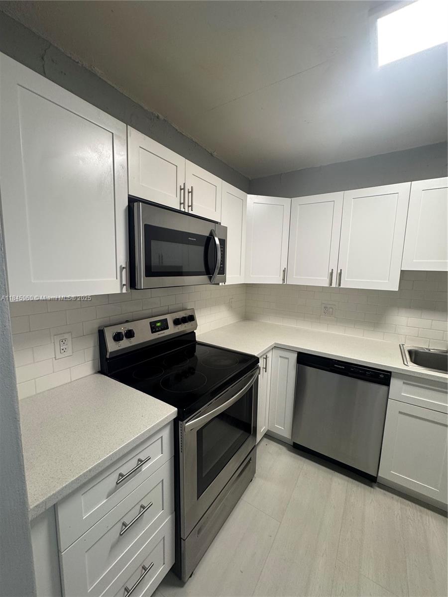 1475 NE 125th Ter 208H