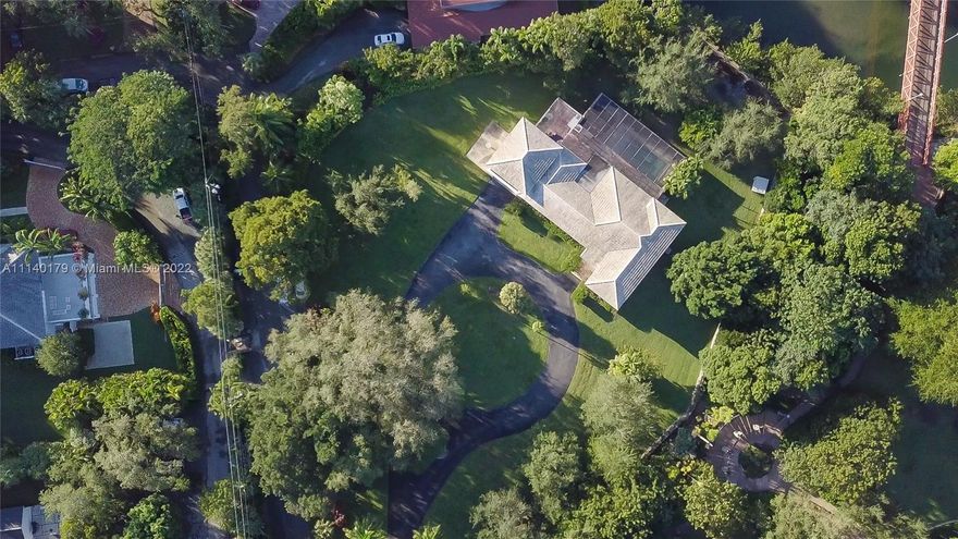 Create a spectacular waterfront estate on 63,000 SF of land, ideally located on the Gables Waterway - with direct ocean access and no fixed bridges to Biscayne Bay. Extremely rare opportunity to own a magical, lush & ultra-private 1.5 acre property on prestigious Edgewater Drive.  Enjoy walking or biking on the tree-canopied Commodore Trail into Coconut Grove's idyllic village with galleries, cafes, boutiques and marinas. Also, just a short drive down historic Old Cutler Road to Fairchild Tropical Botanic Garden & to the scenic, bayfront Matheson Hammock Park & Marina. Minutes to downtown Coral Gables and the city of South Miami's trendy shopping & dining venues.