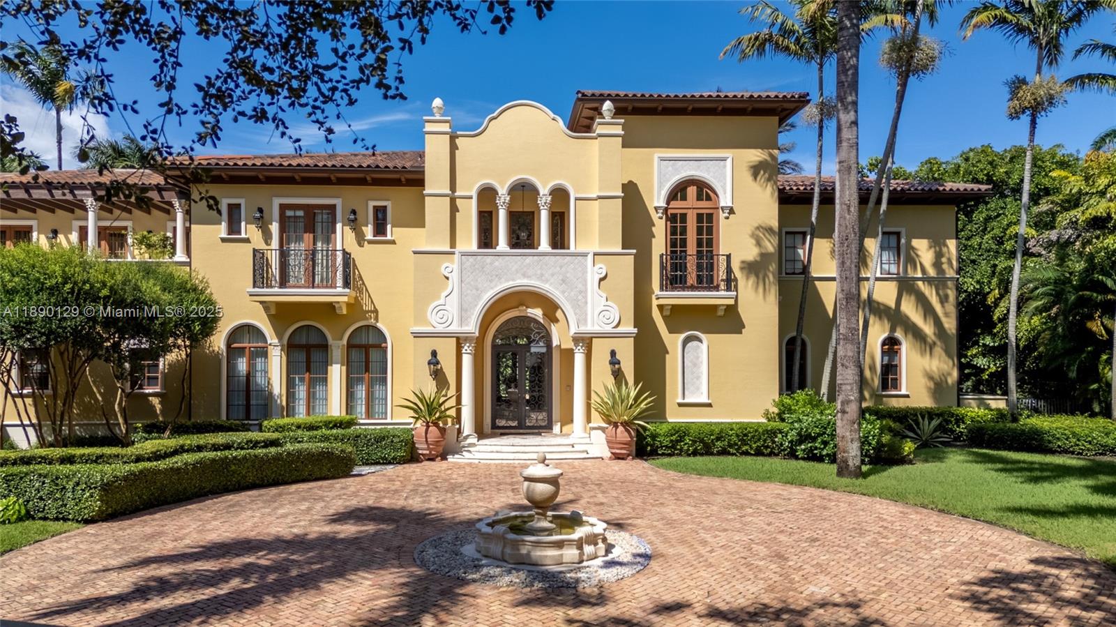 Step into this stunning Pinecrest estate, nestled on nearly an acre of lush greenery. A gated entrance, circular driveway, and cozy courtyard with soft lighting welcome you to a grand foyer boasting marble floors and towering ceilings. The chef’s kitchen is a dream, equipped with high-end appliances and a spacious island perfect for hosting or everyday meals. The backyard is a true retreat, featuring a summer kitchen, covered dining area, and sparkling pool for ultimate outdoor enjoyment. Other standout features include a stylish home office, playroom, three-car garage, wine cellar, and gazebo, blending charm and practicality seamlessly.