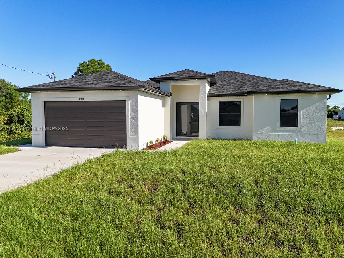 YOUR NEW HOME AWAITS IN LEHIGH ACRES! THIS BRAND NEW 4BED/2BATH WAS THOUGHTFULLY DESIGNED OFFERING AMPLE OPEN FLOOR PLAN,PORCELAIN FLOORS,HIGH CEILINGS,IMPACT DOORS & WINDOWS,QUARTZ COUNTER TOPS WITH WATERFALL STYLE KITCHEN ISLAND,S/S APPLIANCES,COVERED LANAI,SPRINKLERS,WATER TREAMENT EQUIPMENT PLUS A GENEROUS BACKYARD ALLOWING YOU PLENTY SPACE TO ENJOY YOUR OWN PRIVATE OUTDOORS ACTIVITIES,AND IT'S LOCATION OFFERS QUICK ACCESS TO PARKS,GOLF COURSES,AIRPORT, SHOPPING,RESTAURANTS,BOWLING ALLEY,FISHING,BOATING AND THE STUNNING GULF COAST BEACHES!!
CONTACT US TODAY TO SCHEDULE YOUR SHOWING AND DISCOVER ALL THAT THIS EXECEPTIONAL PROPERTY HAS TO OFFER , FOR SURE YOU'LL MAKE IT YOUR HOME!!!