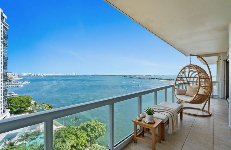 Breathtaking water views from every room in this private corner 3-bedroom, 3-bath residence in the quiet residential side of Brickell. The spacious layout is wrapped in floor-to-ceiling glass and opens to a large balcony with wide-open bay views and sparkling Downtown lights. Enjoy a well-appointed kitchen and electric shades in the bedrooms. Brickell Townhouse sits on 8 acres of lush bay front grounds with resort-style amenities including an oversized heated pool, Jacuzzis, fitness center, tennis courts, BBQ area, EV charging stations, kids’ playroom, valet, and more. Peaceful waterfront living just minutes to Brickell’s best dining, shopping, and entertainment. A perfect place to call home.
