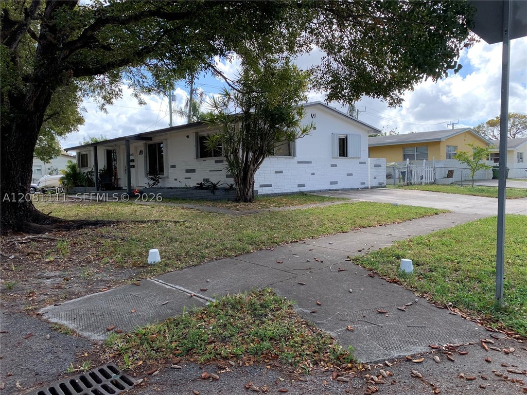 Photo of 401 SW 8th St #A, Hallandale Beach, FL 33009 (MLS # A12081111)