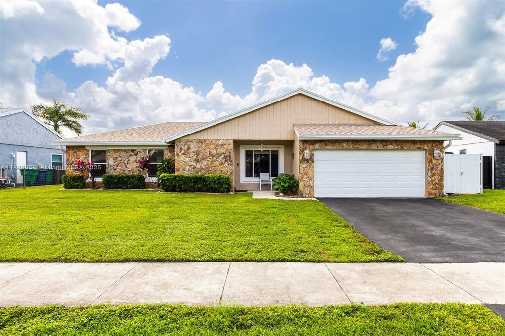 Photo of 11656 SW 50th Ct, Cooper City, FL 33330 (MLS # A11886368)