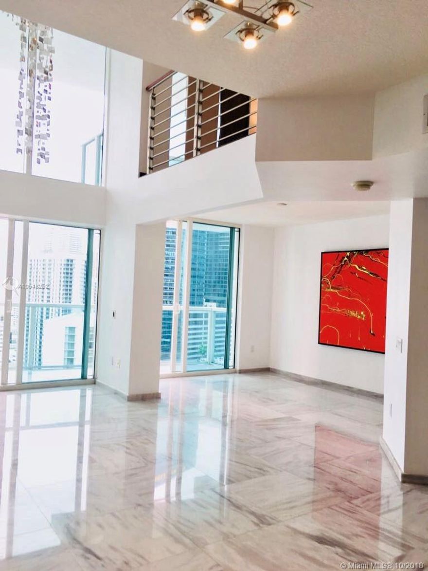 ENJOY THE AMAZING SKYLINE WITH OCEAN AND RIVER VIEWS FROM ANY OF THE TWO BALCONIES IN THIS BEAUTIFUL 2 STORIES LOFT APARTMENT (BOTH ROOMS ARE OPEN AND CAN BE EASELY RECONVERTED WITH AN SMALL INVESTMENT) IN THE HEART OF THE MIAMI FINANCIAL AND ENTERTAINMENT  DISTRICT, STEPS AWAY FROM WORLDWIDE FAMOUS BRICKELL CITY CENTER, BLOCKS AWAY OF DOWNTOWN AND ALL MUSEUMS, OPERA AND MAJOR ATTRACTIONS, THIS 2/2 OPEN LOFT APARTMENT FEATURES STAINLESS STEEL APPLIANCES, GRANITE COUNTER TOPS, MARBLE AND WOOD FLOORS. EASY TO SHOW PLEASE CALL OFFICE OR LISTING AGENT.