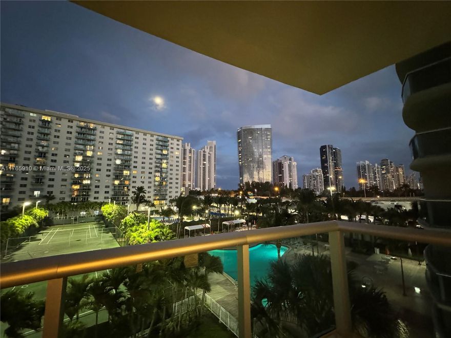 Enjoy an unbeatable location with the beach just across the street and walking distance to the highly rated Sunny Isles School, shops, dining, and luxury towers. The UPDATED LAYOUT features an open-concept kitchen that flows seamlessly into the bright, spacious living-dining area. With no carpeted flooring, the unit offers a modern, clean look. Includes an assigned covered parking space. The building is undergoing a complete renovation. Amenities include a heated pool, BBQ area, tennis court, fitness center, social room, and outdoor recreational space. THE UNIT IS CURRENTLY RENTED BUT CAN BE DELIVERED VACANT FOR OWNER USE, offering flexibility to the buyer. Don't miss out on this incredible opportunity!