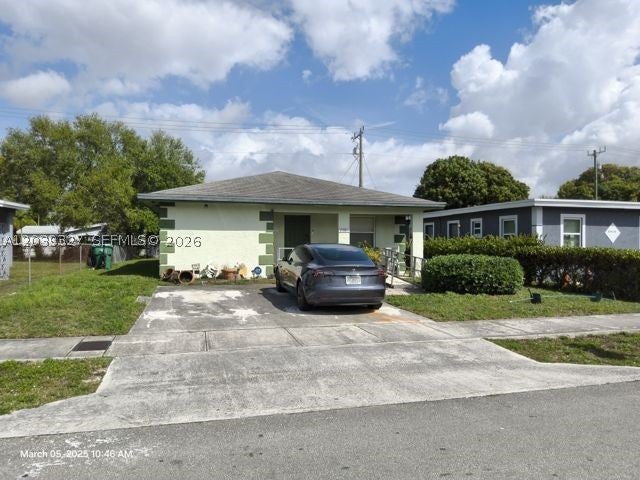 Photo of 2581 NW 15th Ct, Fort Lauderdale, FL 33311 (MLS # A12039327)