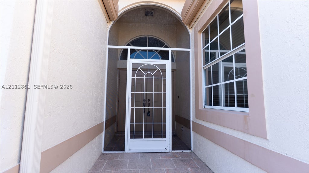 Photo of 1528 SE Holyrood Ln, Port St Lucie, FL 34952 (MLS # A12112861)