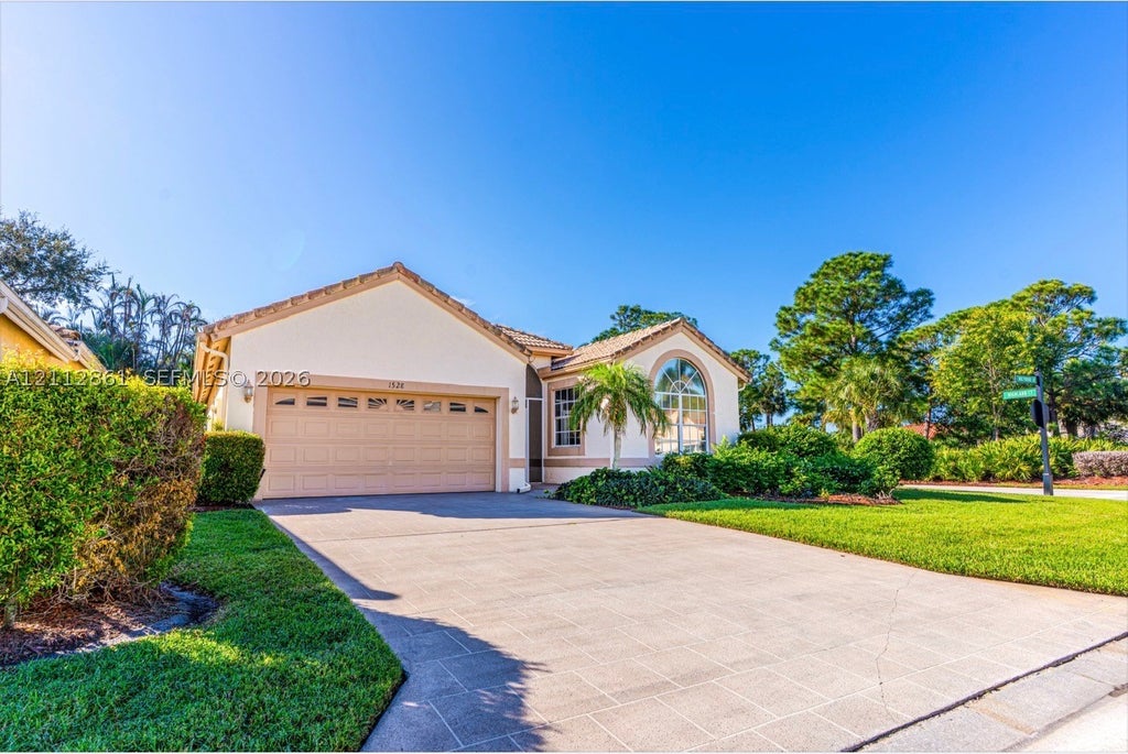 Photo of 1528 SE Holyrood Ln, Port St Lucie, FL 34952 (MLS # A12112861)