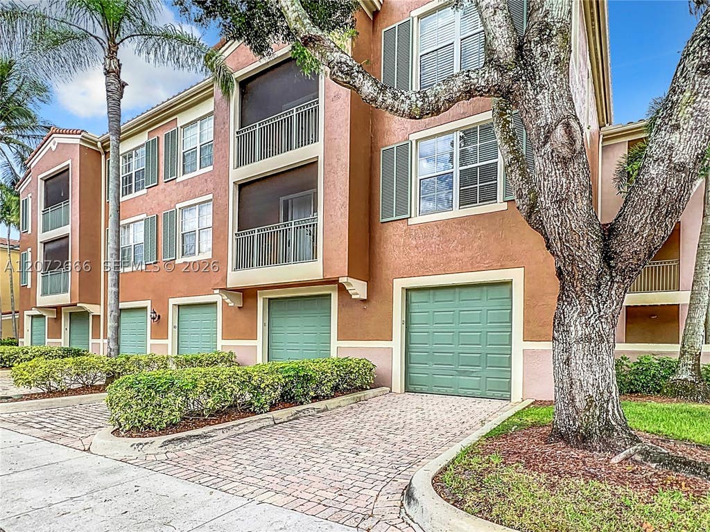 Photo of 11720 Saint Andrews Pl #205, Wellington, FL 33414 (MLS # A12072666)