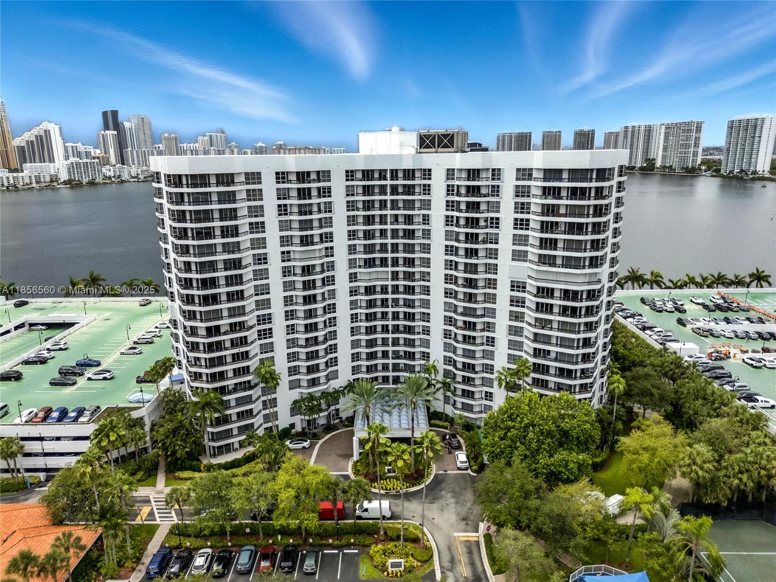 Live the waterfront dream in Mystic Pointe, Aventura! This upgraded 3-bed, 3-bath condo offers marble baths, wood-look ceramic floors, stainless appliances, and in-unit laundry. Wake up to water views from every room and unwind on your private balcony. Enjoy resort-style amenities—pool, gym, sauna, tennis, basketball, EV charging stations, and on-site shops. Cable, Wi-Fi, covered parking, and valet included. Passed 40-year inspection with no special assessments. Dock available to buy or rent—move right in!