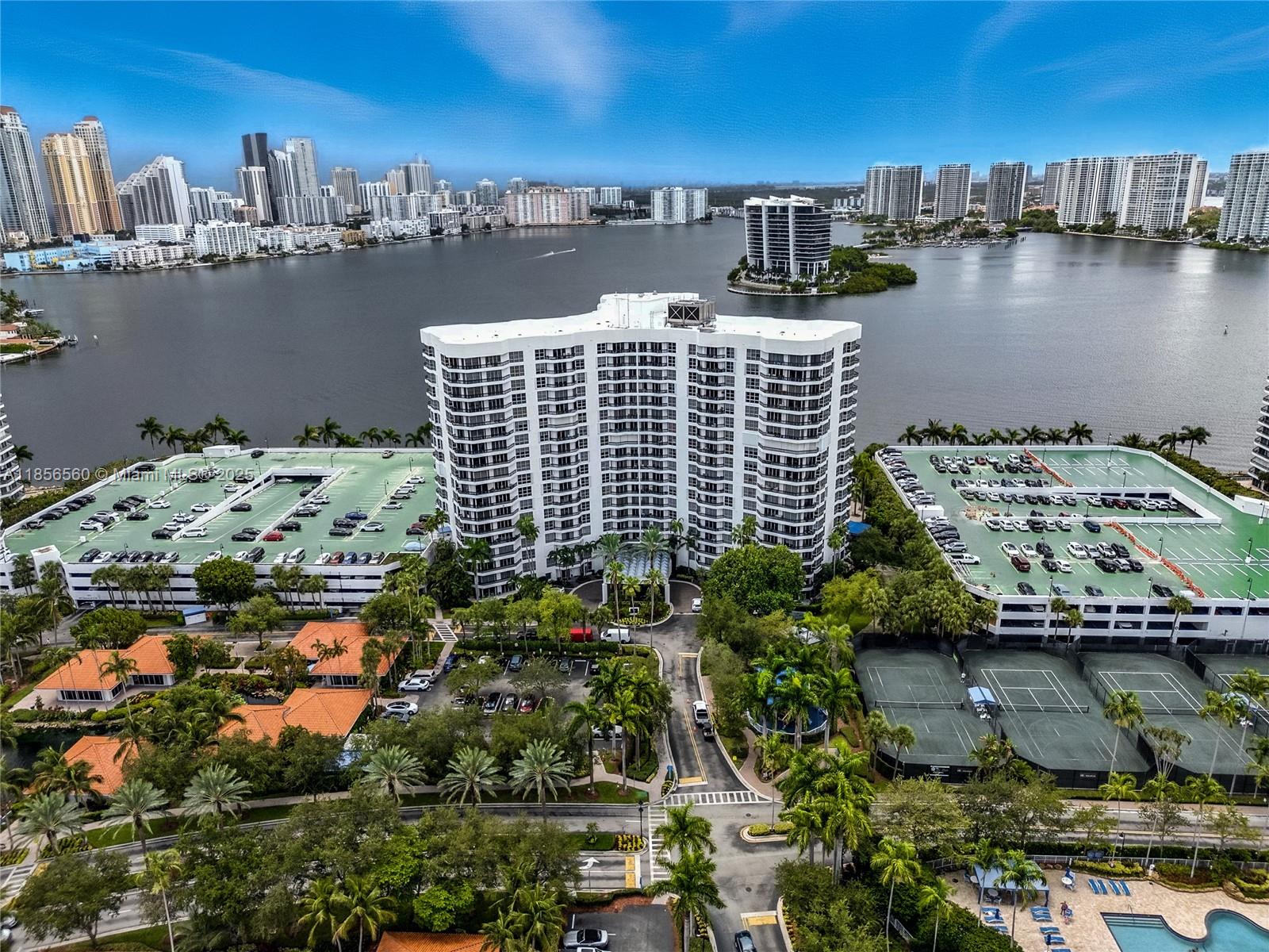 Live the waterfront dream in Mystic Pointe, Aventura! This upgraded 3-bed, 3-bath condo offers marble baths, wood-look ceramic floors, stainless appliances, and in-unit laundry. Wake up to water views from every room and unwind on your private balcony. Enjoy resort-style amenities—pool, gym, sauna, tennis, basketball, EV charging stations, and on-site shops. Cable, Wi-Fi, covered parking, and valet included. Passed 40-year inspection with no special assessments. Dock available to buy or rent—move right in!