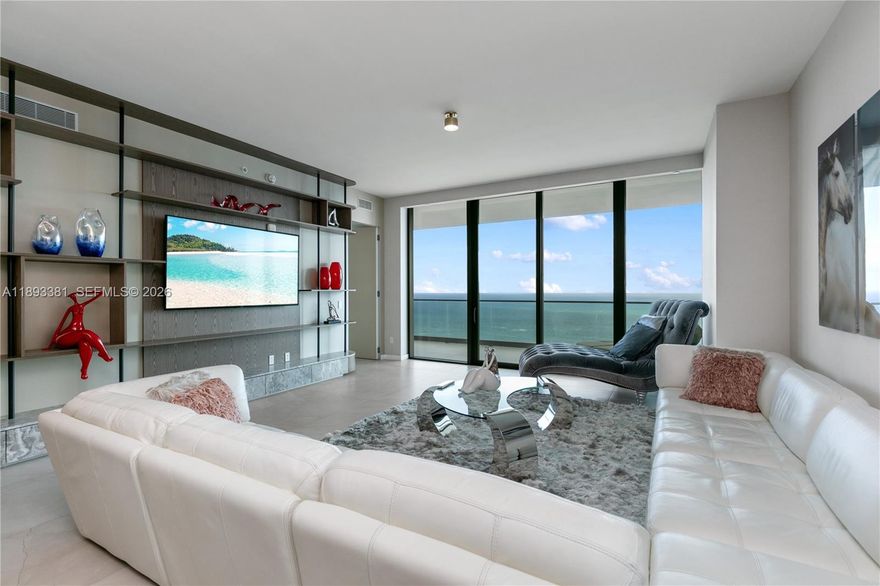 Experience the pinnacle of luxury in this 4 bedroom 5.5 bath Armani Casa masterpiece offered fully furnished with custom finishes on the 34th floor in the most favored 02 Line. This impeccably immaculate and professionally decorated flow-through residence with custom millwork and quality finished designer closets offers the ultimate in luxury. Breathtaking intracoastal and ocean views from an expansive balcony and city skyline views from the second equally expansive private balcony.  Elegant floor-to-ceiling glass windows and a private high-speed elevator provide luxury and convenience. The gourmet kitchen boasts custom European cabinetry with an island, Sub-Zero refrigerator, Wolf oven, wine cooler; all state-of-the-art appliances. Enjoy an amenity-rich lifestyle with over 35,000 sq ft of premier features: private oceanfront restaurant, bar, cigar room, game room, fitness center, spa, heated pool, jacuzzi, dog park, beach service, cinema & 24-hour valet/concierge & security. Interior SF 3176 SF Balconies 886 SF Total SF 4062, per Developer Floor Plan.