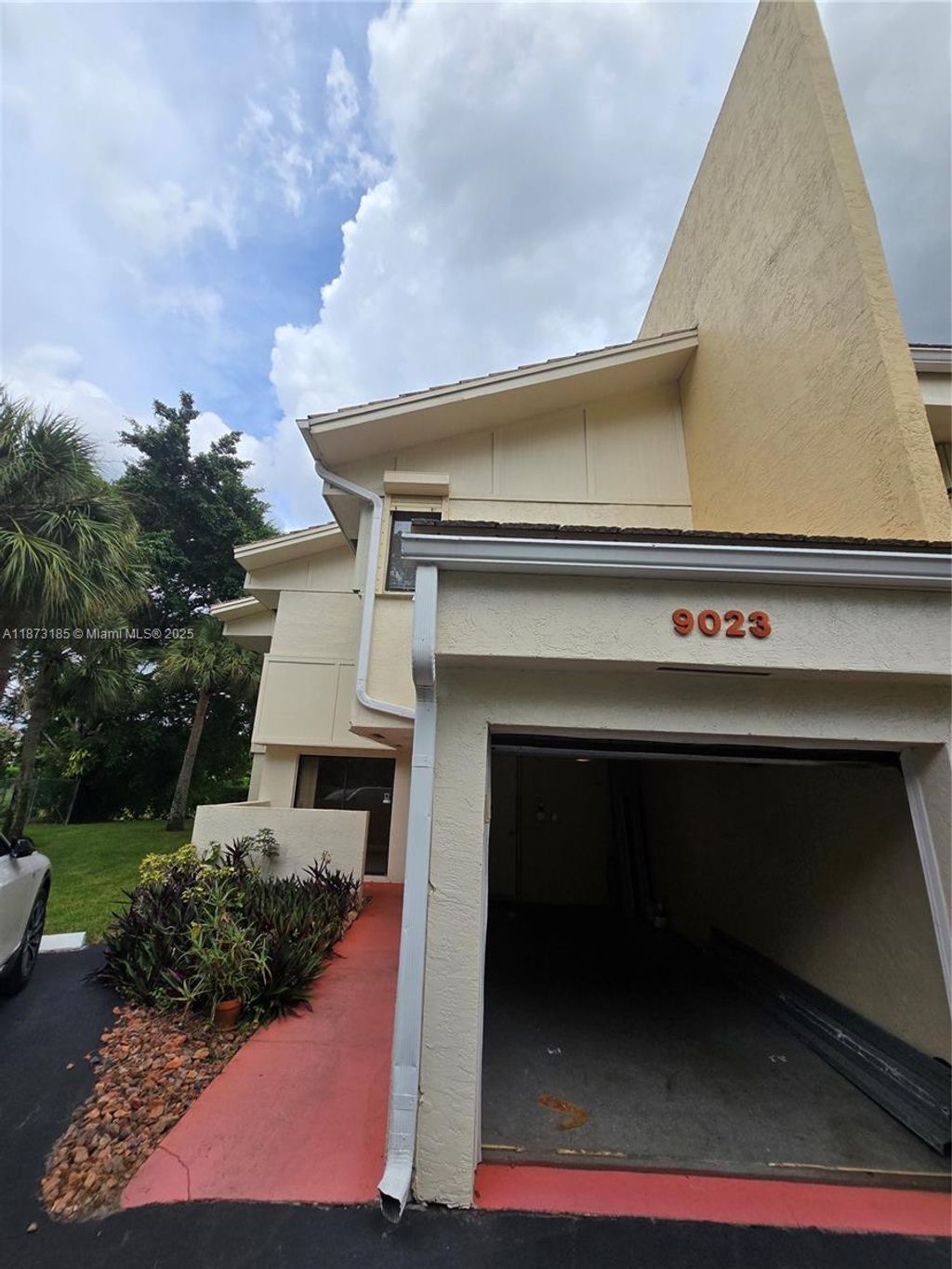 Photo of 9023 NW 38th Dr #9023, Coral Springs, FL 33065 (MLS # A11873185)