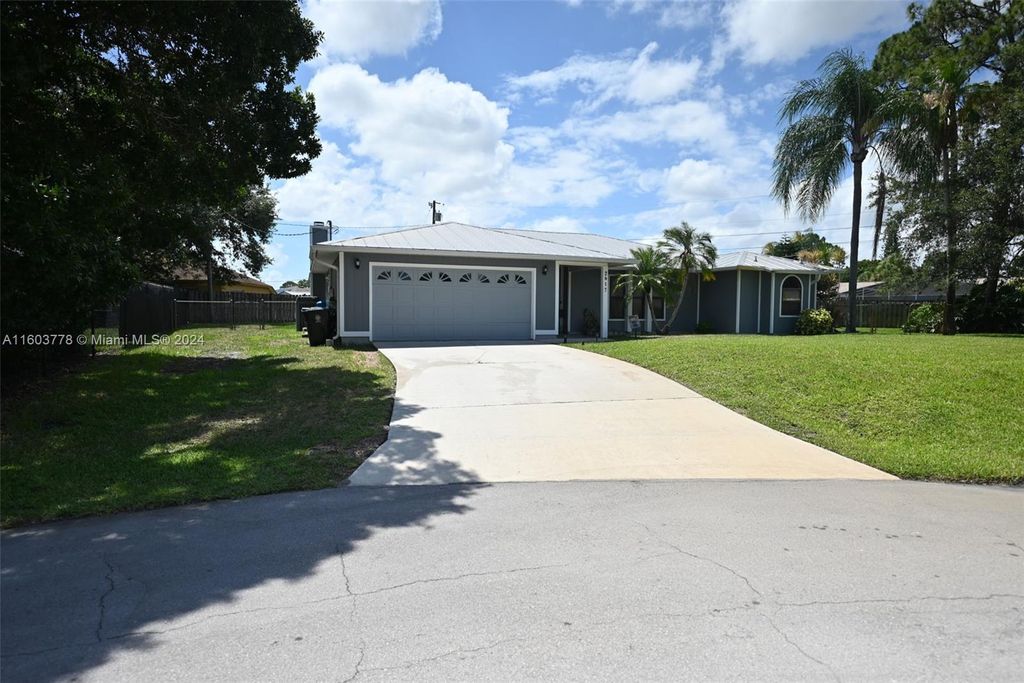 Photo of 2617 SW Elrod Ct, Port Saint Lucie, FL 34953 (MLS # A11603778)