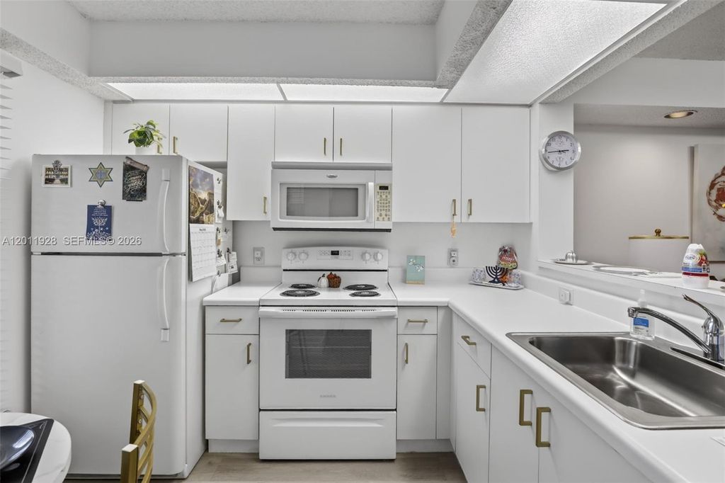 Photo of 800 SW 137th Ave #411G, Pembroke Pines, FL 33027 (MLS # A12011928)