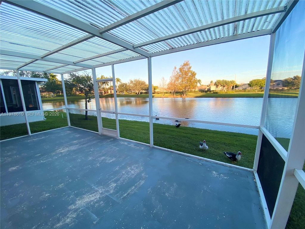 Photo of 611 NW 208th Cir #611, Pembroke Pines, FL 33029 (MLS # A11978610)