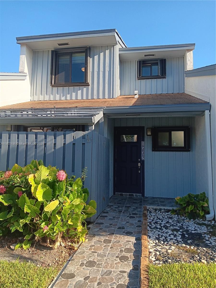 The beach home is located east of US-1, within walking distance of Hollywood Beach, offering all its fine dining and entertainment. Spacious 2-story townhome in a gated community next to the golf course. Minutes to Hollywood Beach, Hollywood Downtown. Fenced porch in front and screened patio in the back, beautiful hardwood floors upstairs, a large master bedroom with a w/balcony. The community features security cameras throughout and a heated pool. Centrally located, close to the airport, shops, restaurants, and the beach. Prospective tenants must submit copies of their IDs, credit reports, background checks, rental applications, and proof of income. Not on the lockbox, CHECK BROKER REMARKS PLEASE.