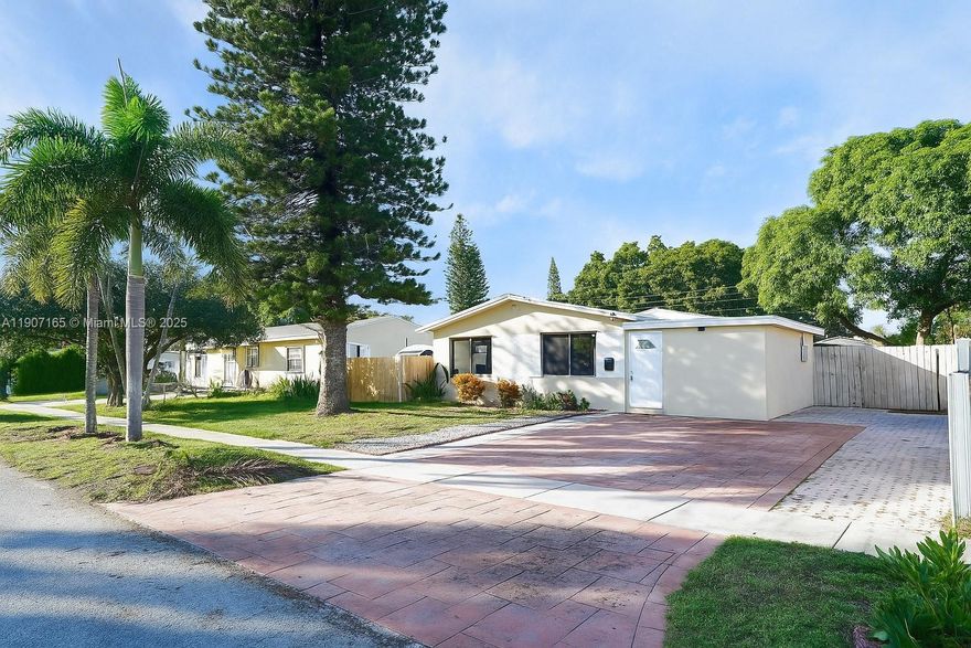 Welcome to this charming 3-bedroom, 2-bath single-family home ideally located in the heart of Hollywood. Featuring bright, open living areas and a functional layout, this residence sits on a spacious 6,361 sq.ft. lot with beautiful landscaping in the front and back. Enjoy outdoor living year-round under the covered terrace, and take advantage of the spacious backyard with ample room for a pool. The kitchen offers ample cabinetry, both bathrooms are well-maintained, and the double driveway with pavers provides excellent curb appeal and extra parking. Conveniently located near schools, parks, shopping, and major highways, the Seller is relocating for work, and a quick closing is possible! No HOA!