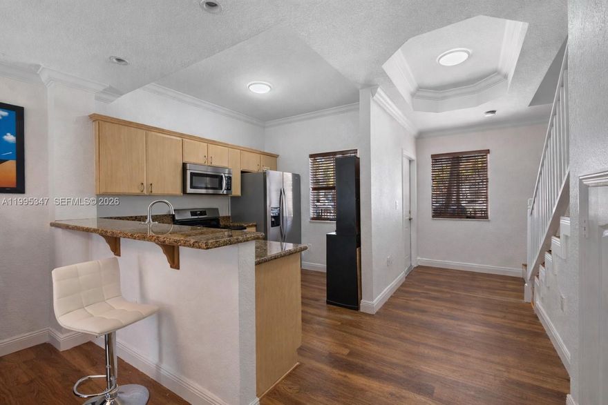 Tucked within the gated community of Melrose Point in San Souci, this beautifully updated residence offers a perfect blend of comfort, style, and convenience. The condo has been thoughtfully upgraded throughout, featuring a brand new A C system, all new appliances, and fully renovated bathrooms with a clean, modern finish. Upstairs, new flooring brings a fresh and cohesive feel, while the main living areas offer an easy, functional layout ideal for both everyday living and entertaining. Step outside to your private backyard, newly finished with turf, creating a low maintenance outdoor space perfect for relaxing, pets, or hosting. Located in a prime North Miami neighborhood just minutes from the beach, Bal Harbour Shops, and top dining, this is a turnkey opportunity in a secure and highly desirable community. Tenant occupied.