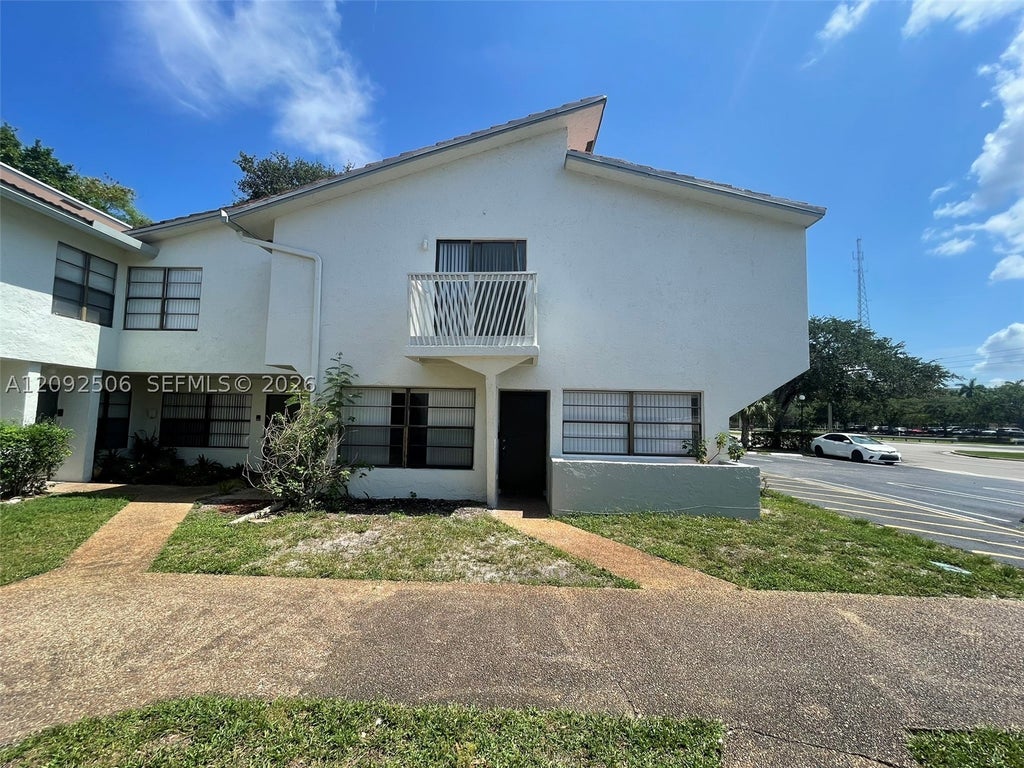 Photo of 2580 Coral Springs Dr #2580, Coral Springs, FL 33065 (MLS # A12092506)