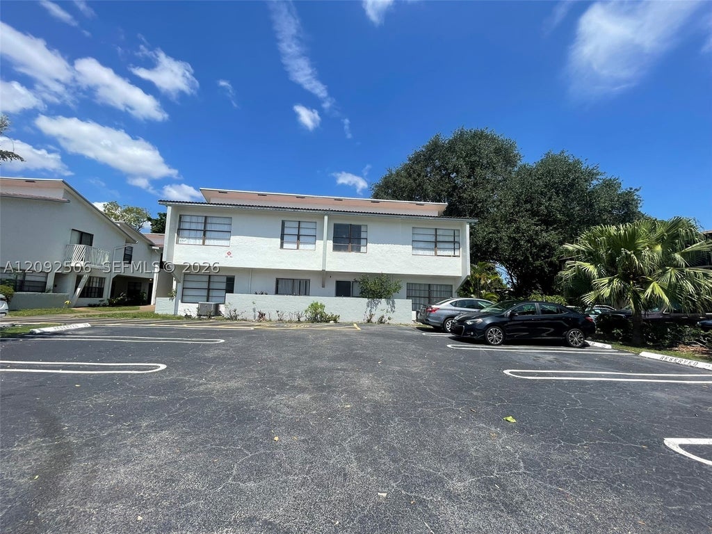 Photo of 2580 Coral Springs Dr #2580, Coral Springs, FL 33065 (MLS # A12092506)