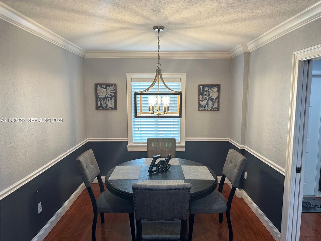 Photo of 9891 NW 24th St, Sunrise, FL 33322 (MLS # A11945232)