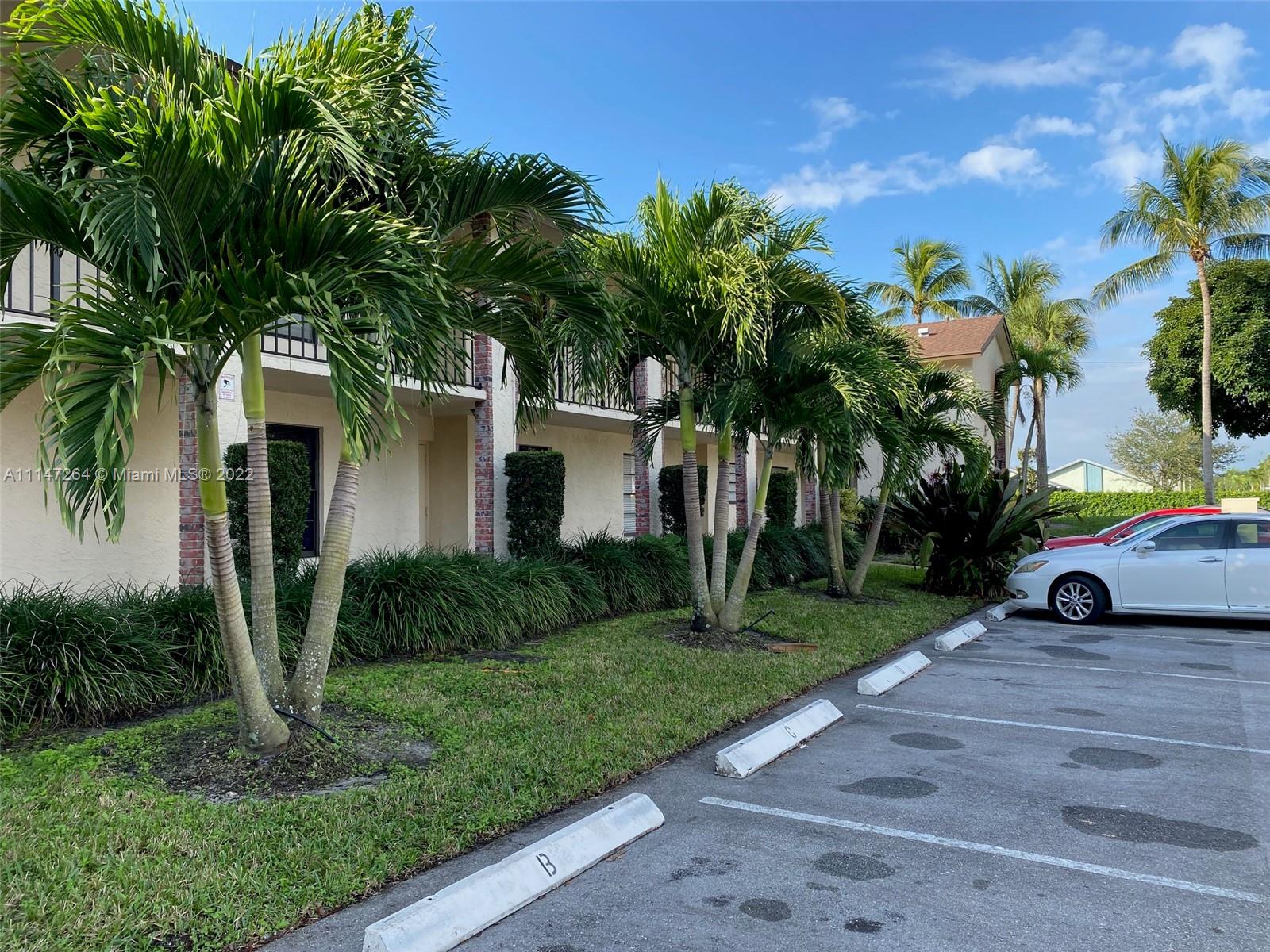 Condo located in Gables East. Spacious two bedroom, two bathroom condominium on the first floor, canal view, and screened porch. Bring your paint brush and design ideas.