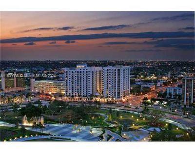 Cozy, spacious split floorplan. Unit available UNFURNISHED or FURNISHED. Located at the Radius Condominium on Young Circle w/large balcony overlooking fountain and garden. LVT throughout, only bedrooms have carpet. Walking distance to all shops and bistros in Downtown Hollywood. 5 min. to the beach, 10 min. to Ft. Lauderdale/Hollywood Airport, heated rooftop pool, theater, party room, gym w/saunas and treatment room, tension pool, Clubroom with full-service kitchen, business center, 24-hour attended lobby / security, covered controlled access parking and 24-hour valet. Unit is fully equipped, full size washer/dryer, water, basic Internet and basic cable included in rent. **PARKING SPACE VERY CLOSE TO BUILDING ENTRANCE FROM PARKING GARAGE