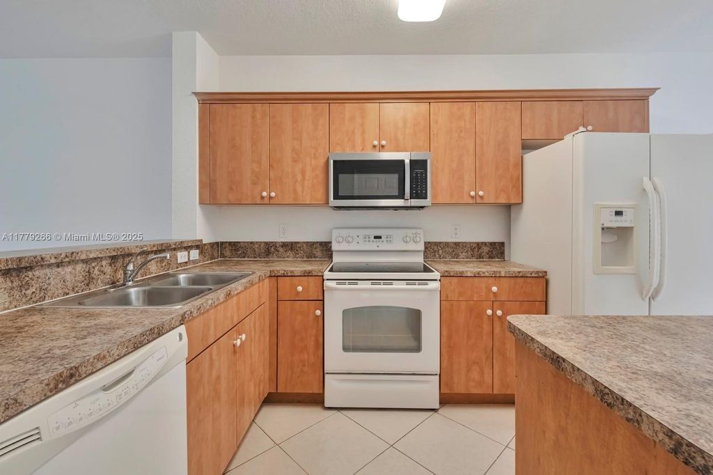 Photo of 1925 Gardenia Ct #1925, Riviera Beach, FL 33404 (MLS # A11779266)