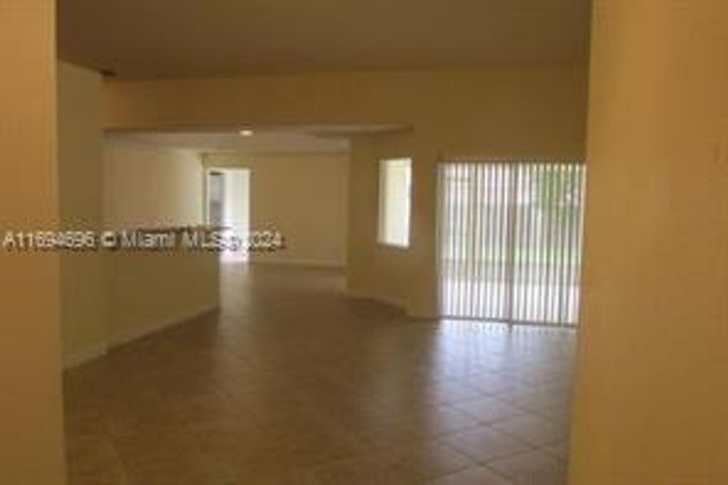 Photo of 1049 SW Payne Ave, Port Saint Lucie, FL 34953 (MLS # A11694696)