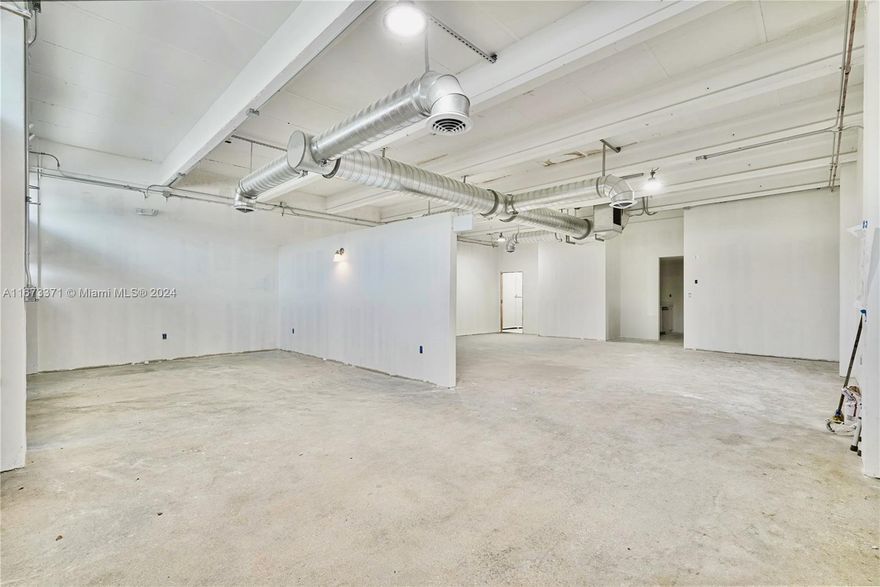 1,567 SF of move in ready and freshly renovated space. 100% A/C.  Join other tenants including The Wynwood School of Music in this  meticulously renovated property.  Corner unit with loads of natural light.  Oversized impact windows and doors.  This location is well suited for professional space, art studio/gallery, office showroom, or E-commerce businesses.  Easy to show.