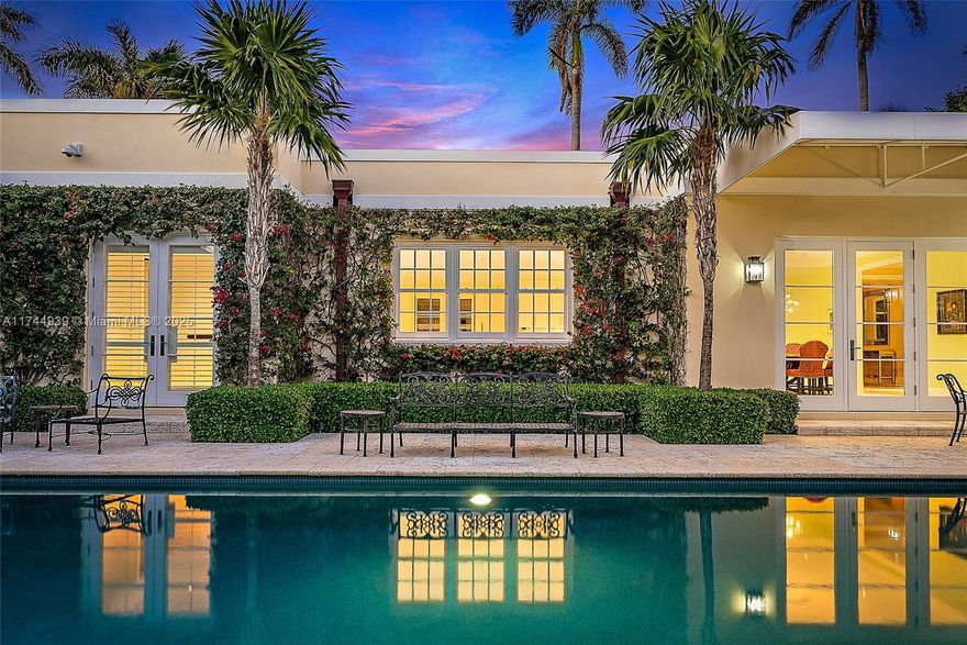 This beautifully updated four-bedroom, four-bathroom home offers modern comfort in a peaceful and highly desirable Palm Beach location. Under went a major renovation in 2019, updates include a new roof, impact windows and doors, updated electrical, air conditioning, and a refreshed pool with new tilework. Thoughtfully designed, this home blends stylish upgrades with a tranquil setting, offering a perfect balance of privacy and convenience. Situated on a beautifully maintained, quiet street, this property provides a rare opportunity to enjoy a private retreat while remaining close to everything Palm Beach has to offer. The spacious backyard is surrounded by lush landscaping and features a large private pool, creating an ideal space for relaxation or entertaining.