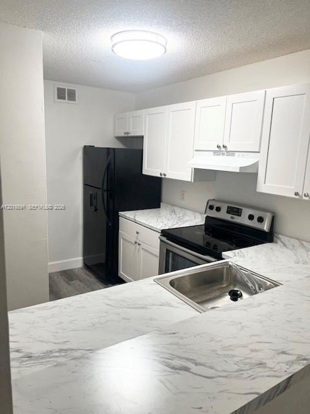 Photo of 10709 Cleary Blvd #211, Plantation, FL 33324 (MLS # A12018591)