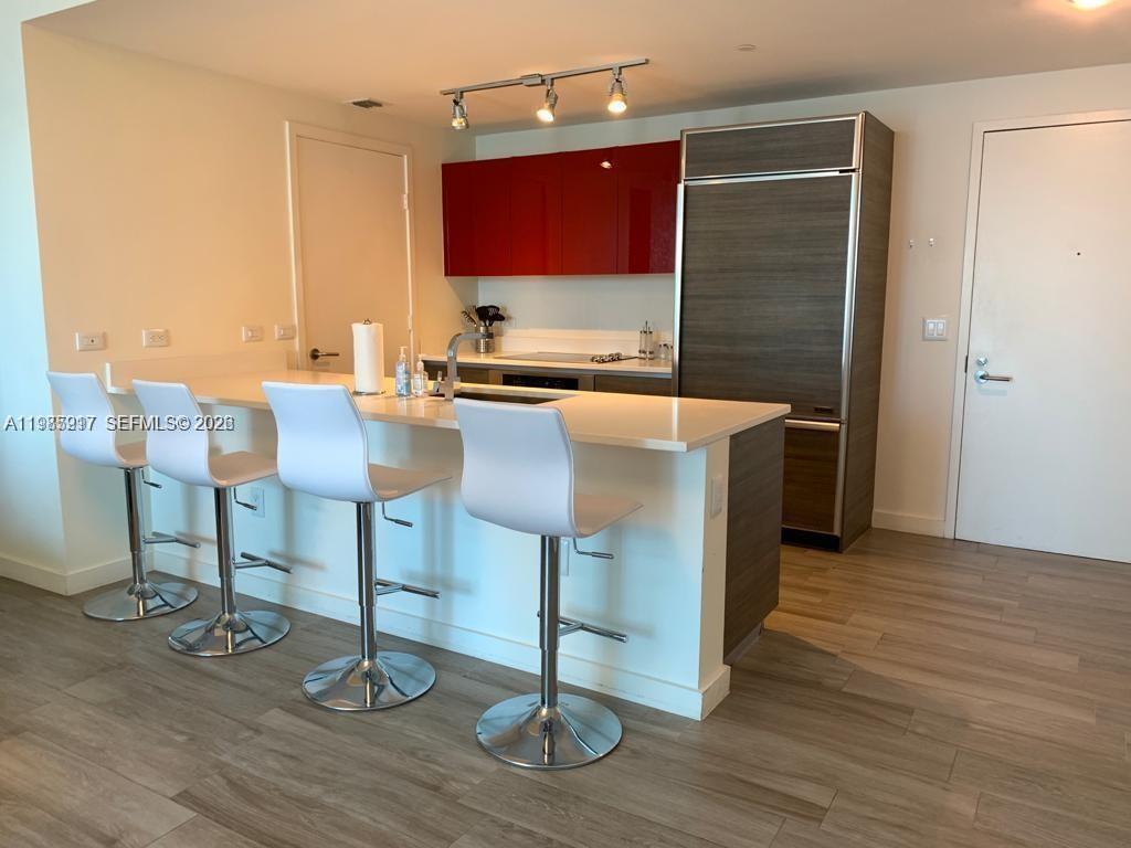 1100 MILLECENTO RESIDENCE - Residential Lease