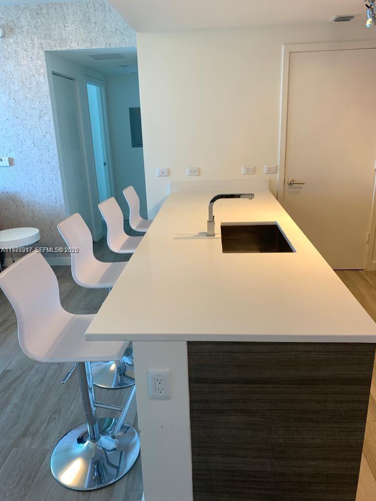 1100 MILLECENTO RESIDENCE - Residential Lease