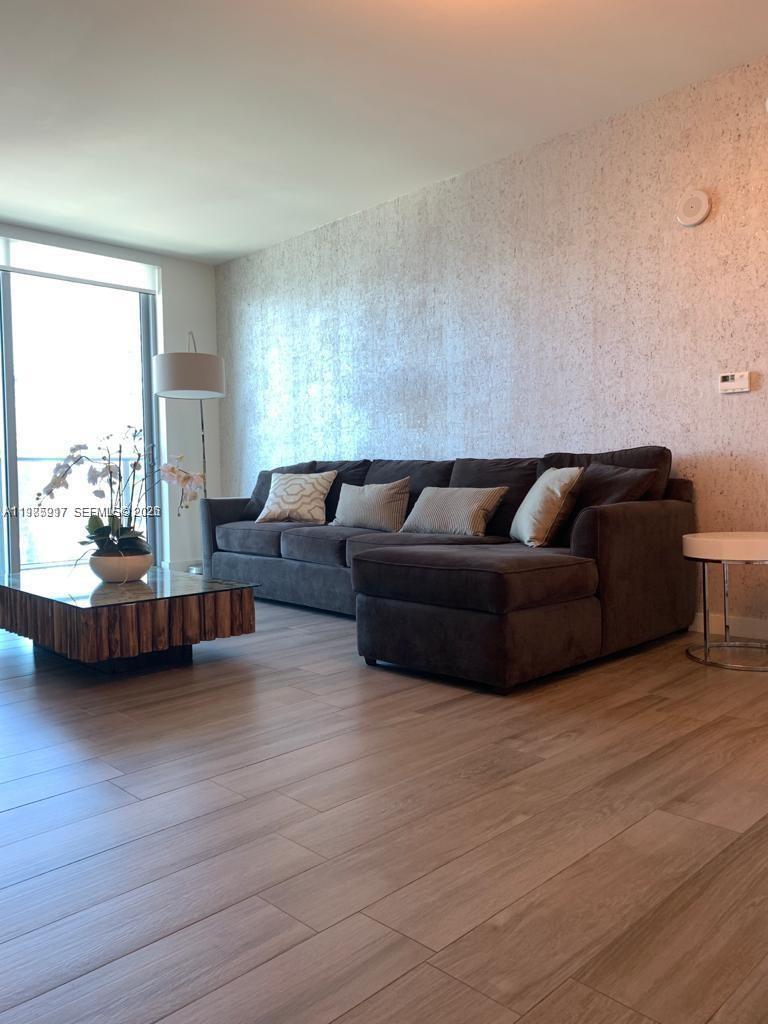 1100 MILLECENTO RESIDENCE - Residential Lease