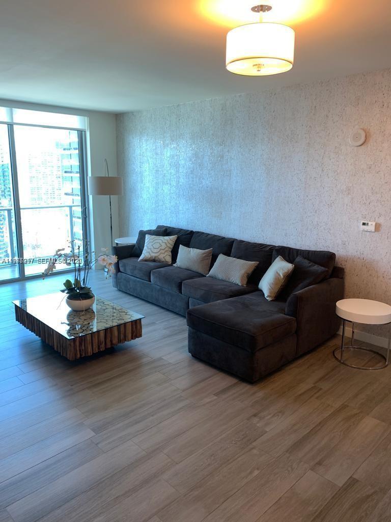 1100 MILLECENTO RESIDENCE - Residential Lease