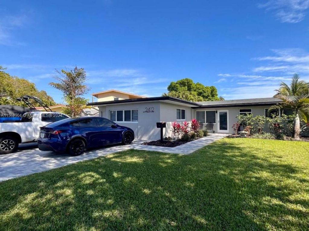 Photo of 2412 Key Largo Ln #2412, Fort Lauderdale, FL 33312 (MLS # A11562904)