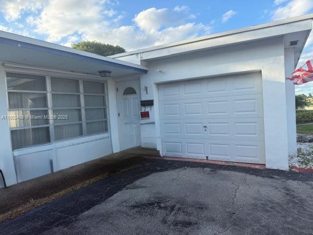 Photo of 2171 NW 93rd Ln, Sunrise, FL 33322 (MLS # A11903489)