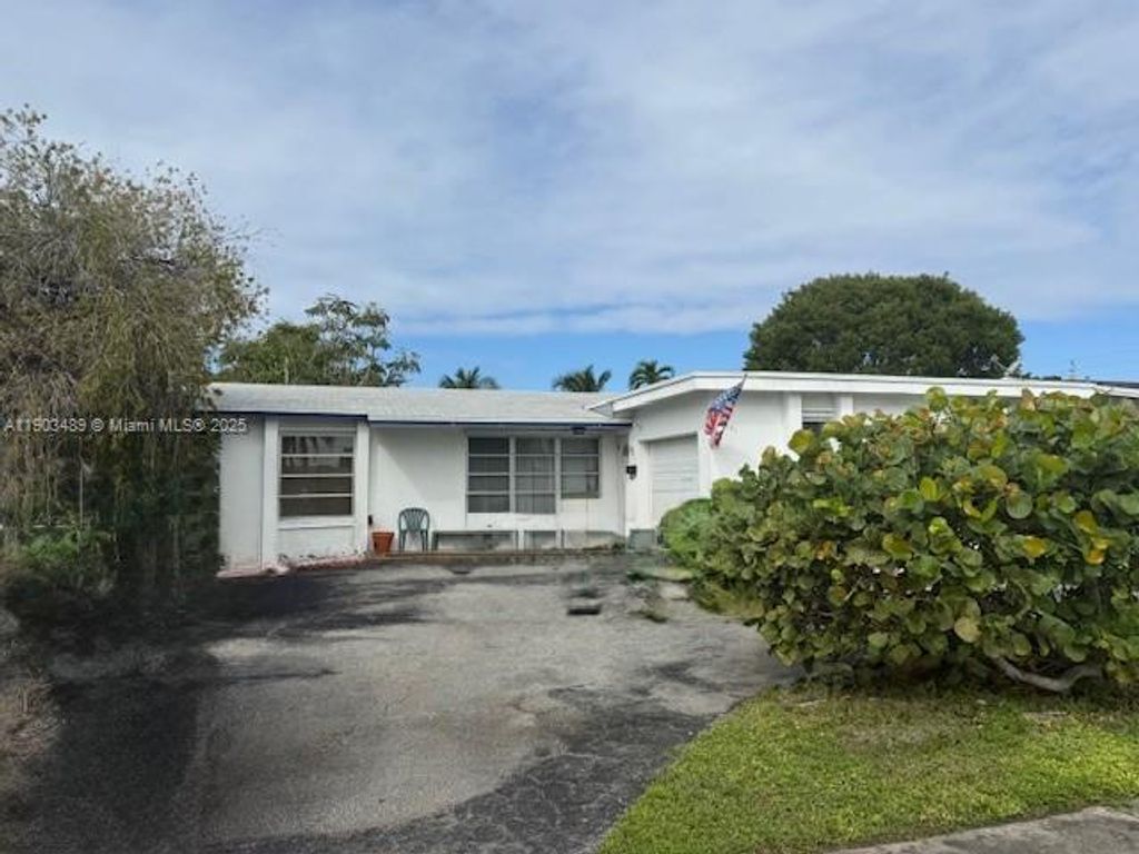 Photo of 2171 NW 93rd Ln, Sunrise, FL 33322 (MLS # A11903489)