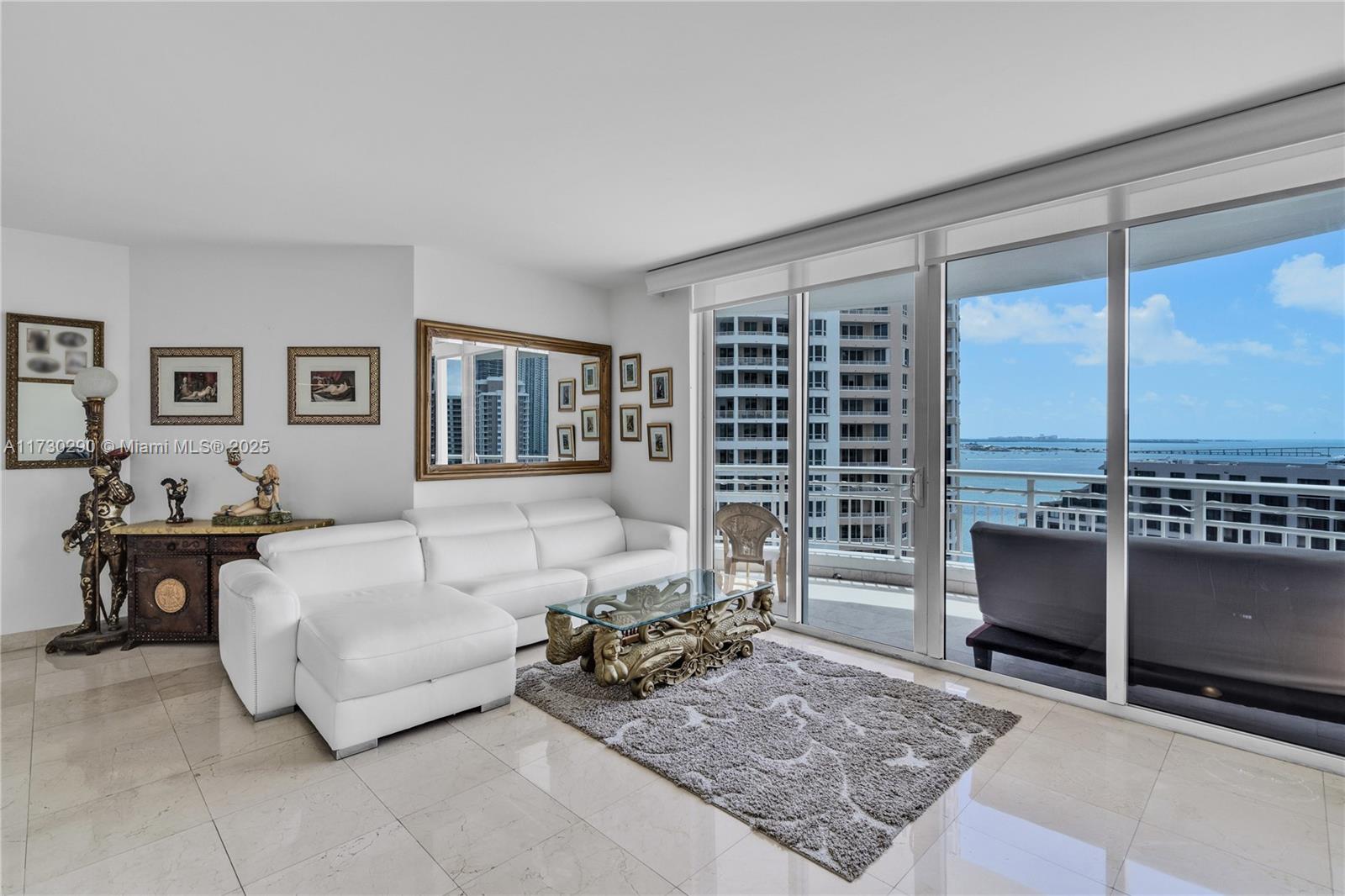 This stunning waterfront condo in the upscale island community of Brickell Key features breathtaking views of the Miami skyline and Biscayne Bay. With 1,280 square feet of living space, this 1 bed/1 bath unit boasts an open floor plan, modern finishes, marble floors and carpeting in the bedroom. Furnished preferred, unfurnished available for $4,200 starting May 2024. Enjoy the ultimate luxury living experience with access to top-notch amenities such as fitness center, tennis court, pool, spa, business center, 24-hour concierge, valet. The island features a market, restaurants, a scenic path, a park, and provides easy access to shopping, dining, and entertainment in the vibrant Brickell area. Don't miss out on this opportunity to live in one of Miami's most desirable neighborhoods!