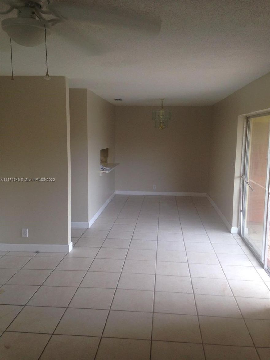 Spacious corner unit in a very convenient area, private community with well-maintained landscaping. This property is minutes away from major routes, highways/expressways, schools, shopping, restaurants and the hospital. The community is across from a beautiful recreational park. It is a 2 bedroom 1 bathroom, with a screened patio and a large living room perfect for entertaining. The HOA requires a 600 minimum credit score.