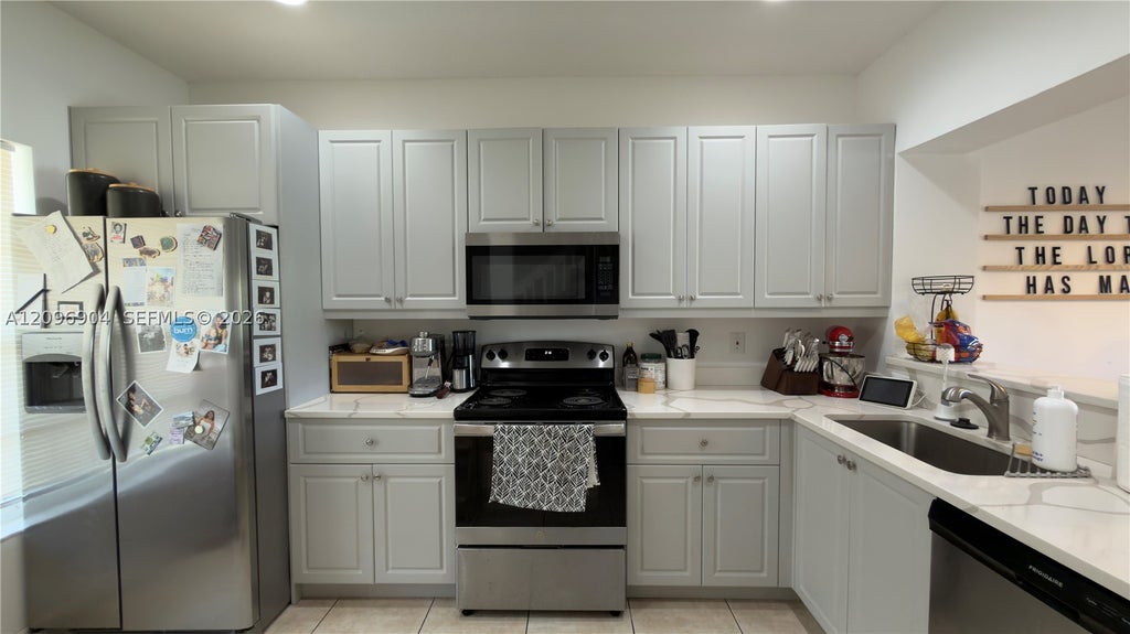 Photo of 5060 Palmbrooke Cir, West Palm Beach, FL 33417 (MLS # A12096904)