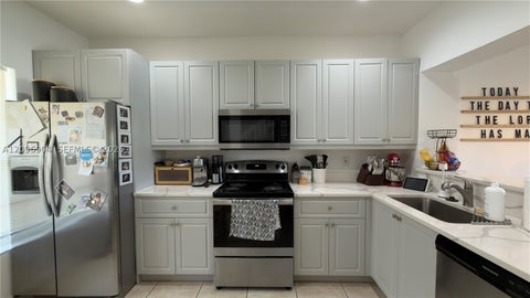 Photo of 5060 Palmbrooke Cir, West Palm Beach, FL 33417 (MLS # A12096904)