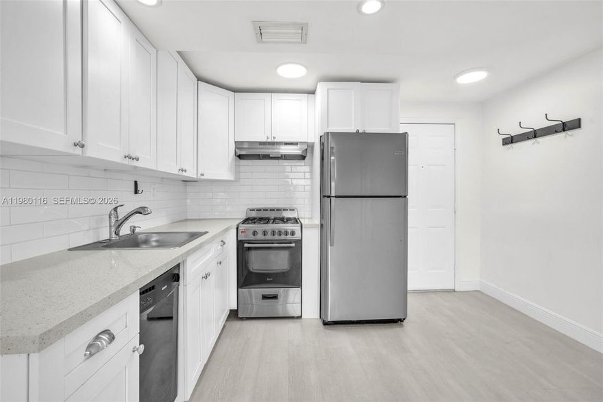 Beutifully remodeled 2-bedroom, 2-bathroom unit in the heart of Coconut Grove. Nestled within a gated community. This residence offers an open layout, split bedroom plan, walk-in closets, two independet entrences, washer and Dryer in Unit, and an assigned parking space. Enjoy an unbeatable location just steps from CocoWalk’s shops, dining, luxury theater, events, and vibrant entertainment.