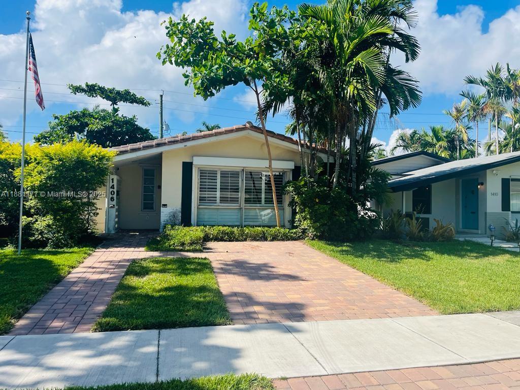 Fantastic location just blocks from the ocean and Hollywood Boardwalk! This spacious home features 2 bedrooms plus an additional office/den that can easily be converted into a 3rd bedroom. The open floor plan is enhanced by tile flooring throughout and large bay windows overlooking the golf course. Enjoy renovated bathrooms with spa-like finishes and a fully updated kitchen designed for modern living. The converted garage offers flexibility as an additional room or an entertainment space. The privately fenced yard includes a sparkling pool and convenient alley access at the back. A rare combination of comfort, versatility, and unbeatable location.
