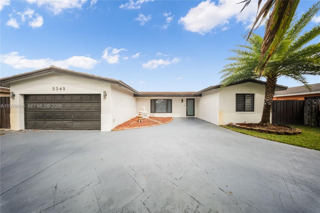 Photo of 9349 NW 24th Pl, Pembroke Pines, FL 33024 (MLS # A11978696)